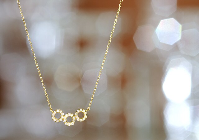 K18 diamond necklace three rings