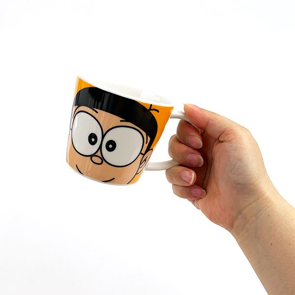 ドラえもん のび太 フェイスマグ  m オレンジ マグカップ 休憩 ホット 食器(mcd)