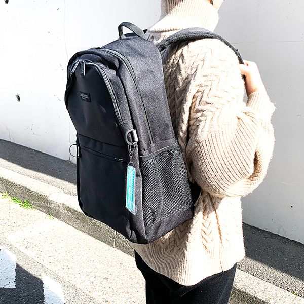 オサムグッズ リュック ラウンド グレーロゴ リュック バッグ 通学 旅行 学校